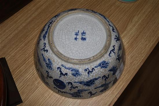 A Chinese blue and white dragon dish and a blue and white crackle glaze bowl, 19th century 37 & 26cm.